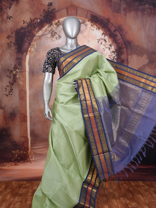 Elegant Pastel Green Pure Silk Cotton Saree with Indigo Blue Zari Border