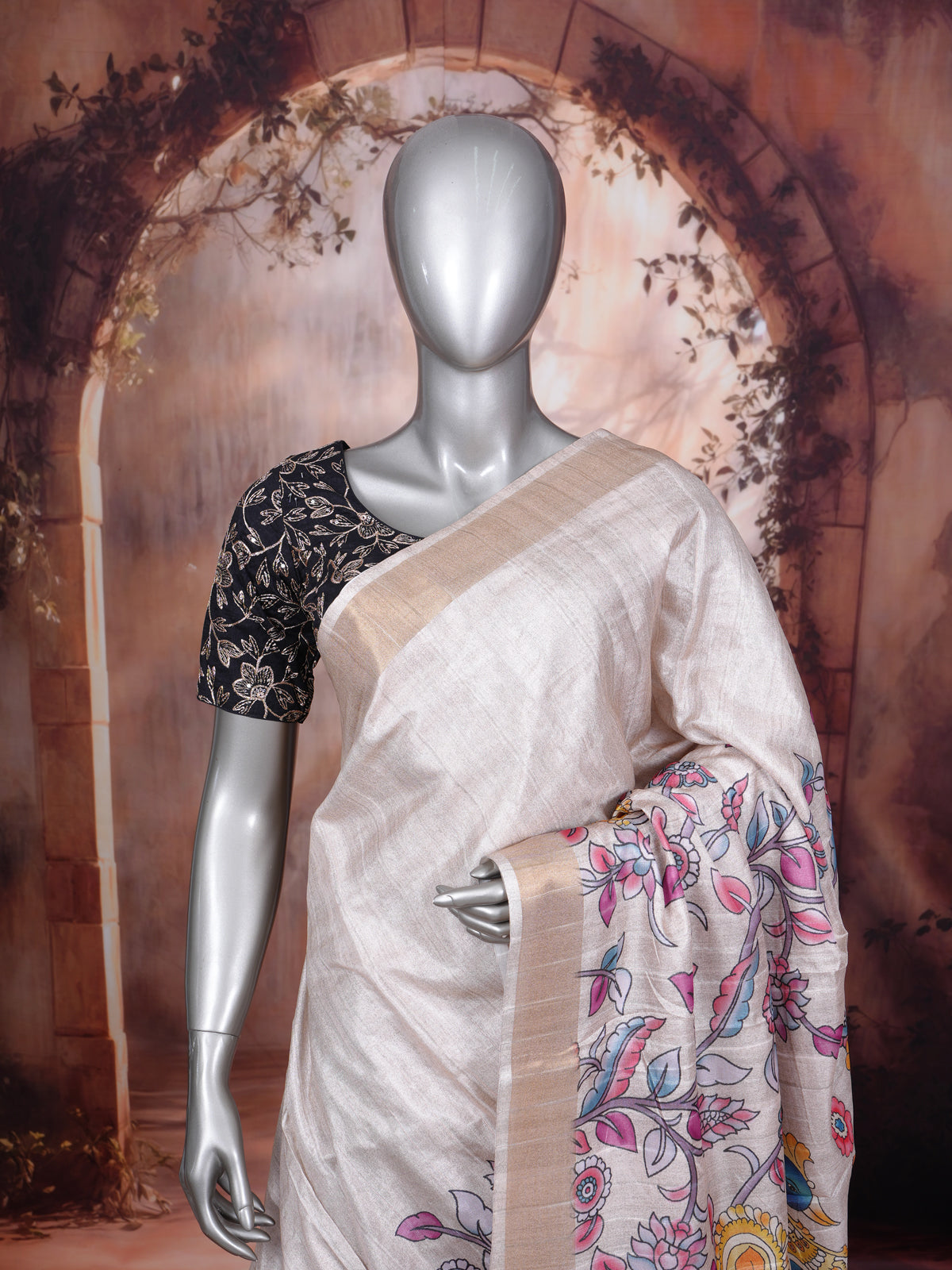 Off-White base with a vibrant multicolor Dola Silk Saree