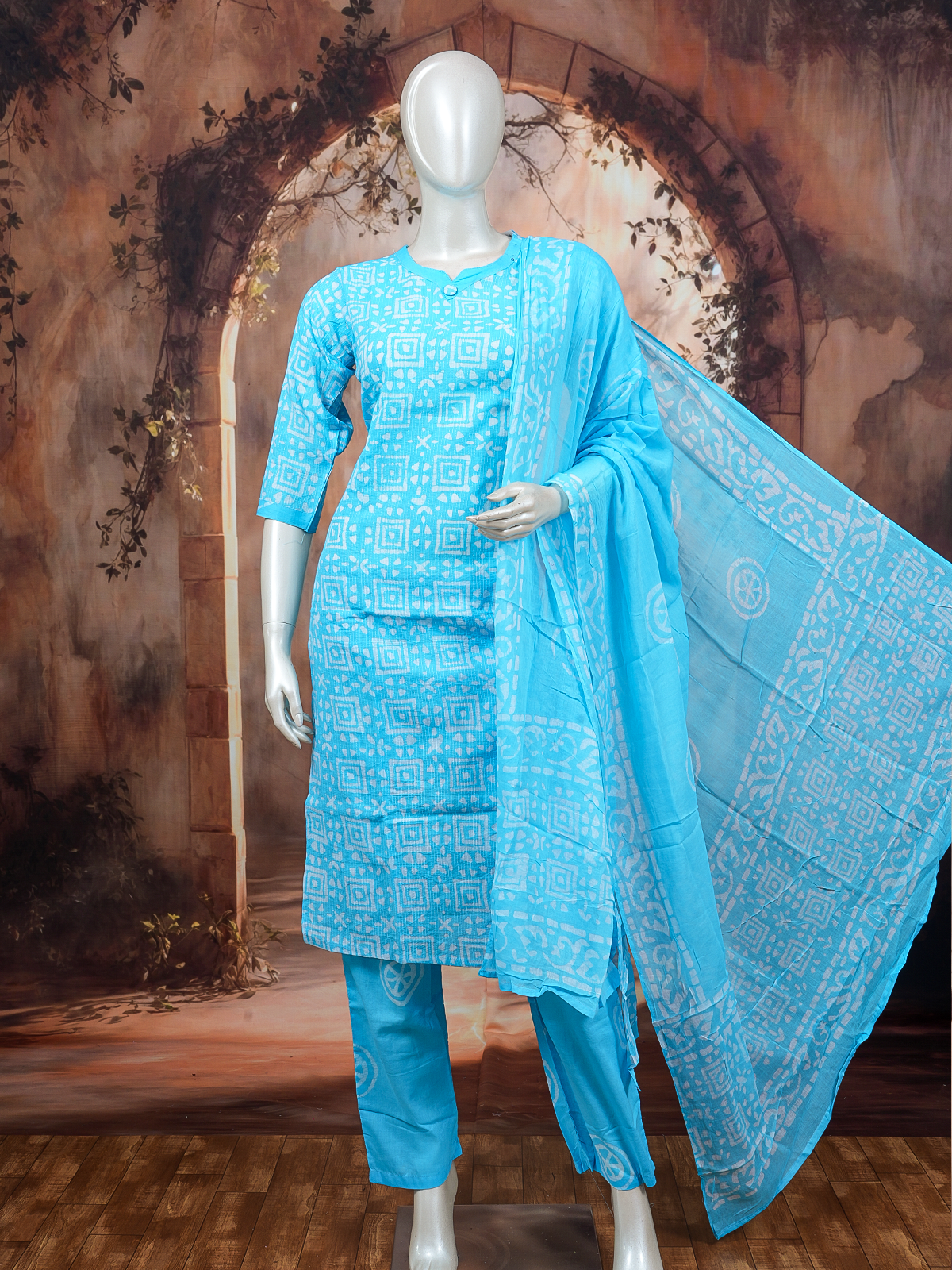 Sky blue and white batik print cotton kurti set with straight pants and tasseled dupatta