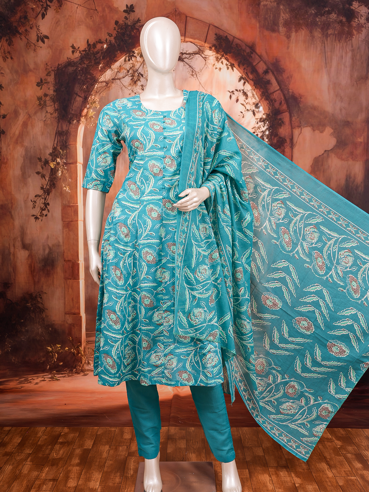 Teal floral printed cotton kurti set with straight pants and matching printed dupatta