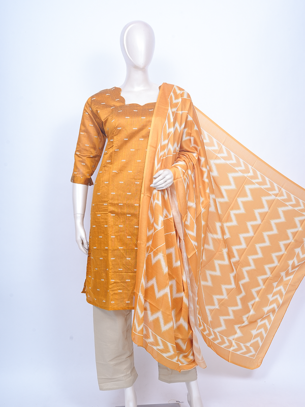 Mustard yellow woven buti kurti set with cream pants and ikat chevron print dupatta