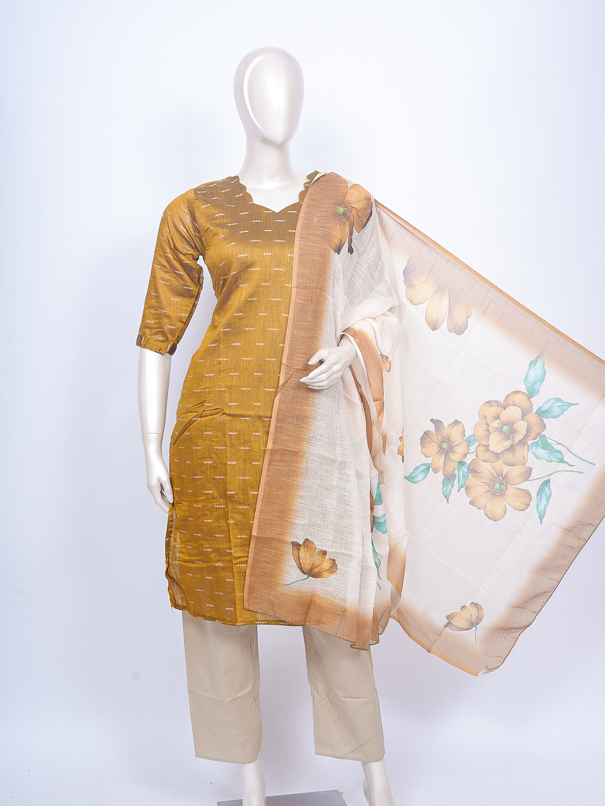 Mustard woven kurti set with beige pants and floral print cream dupatta
