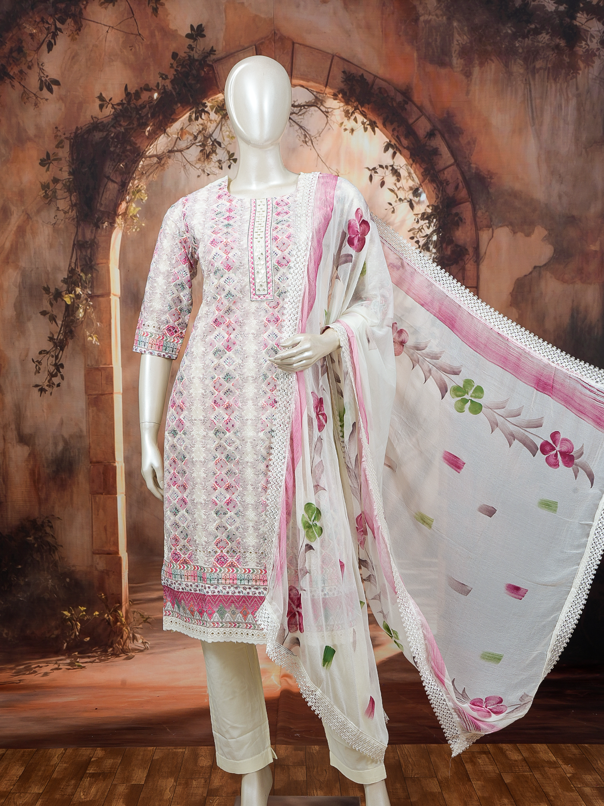 Off-white kurti set with pink multicolour floral embroidery and a floral-print lace-border dupatta