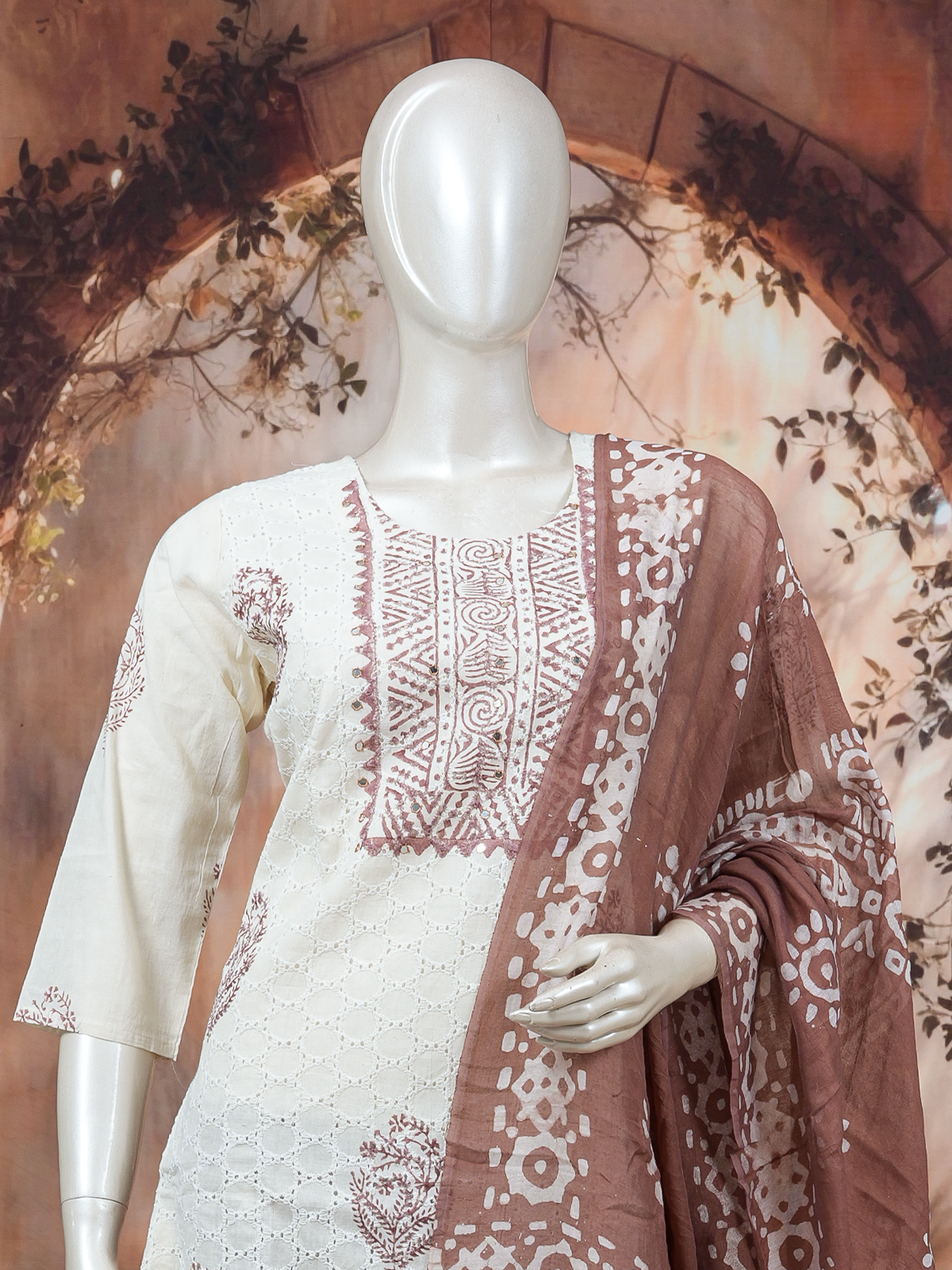 Cream schiffli cotton kurti set with brown batik-print dupatta and straight-fit pants