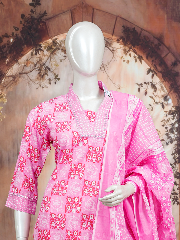 Pink floral print cotton kurti set with mirror-work neckline, straight pants, and matching printed dupatta