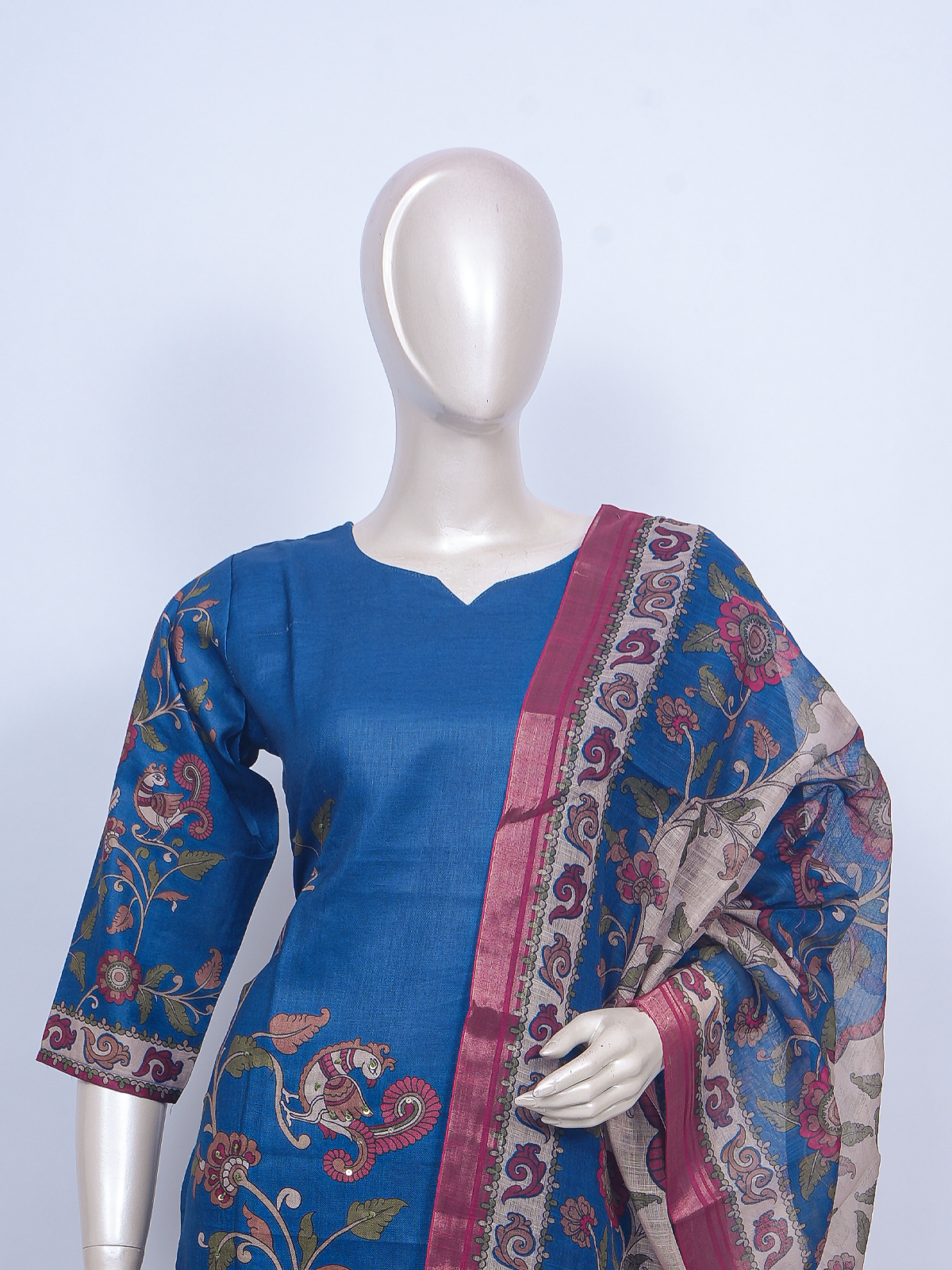 Blue Kalamkari print ready made kurti set with straight pants and contrasting cream floral dupatta