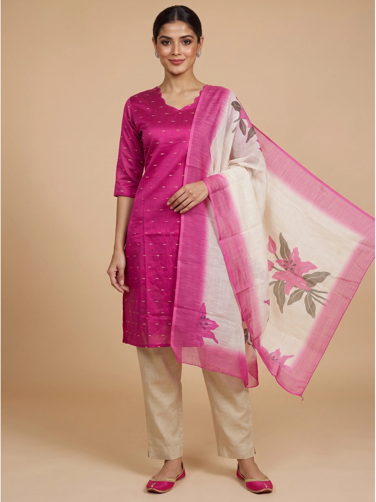 Rani pink art silk kurti set with gold butis, beige pants and cream floral print dupatta