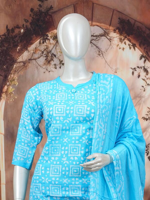 Sky blue and white batik print cotton kurti set with straight pants and tasseled dupatta