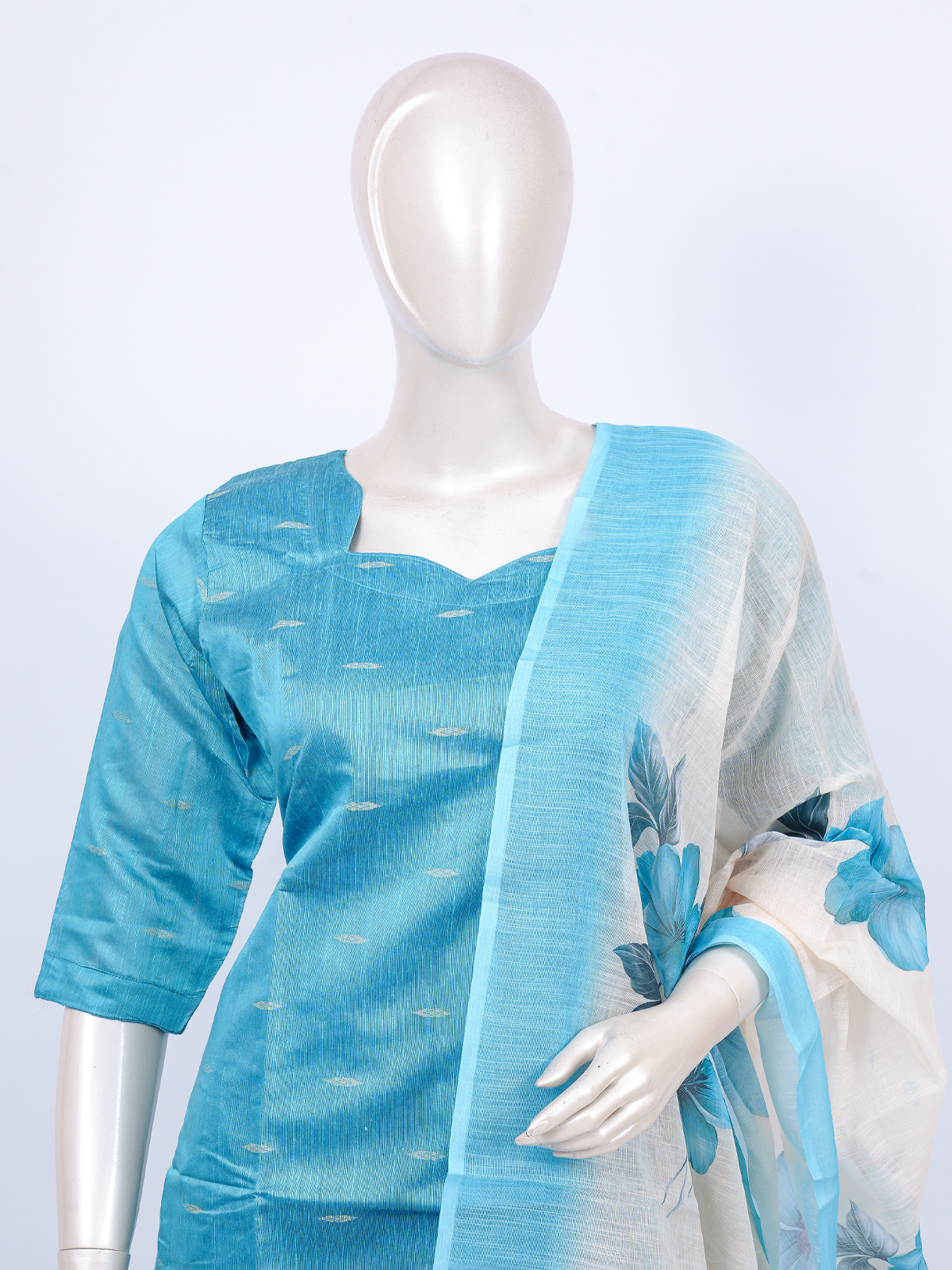 Sky blue straight kurti set with beige pants and cream floral printed dupatta