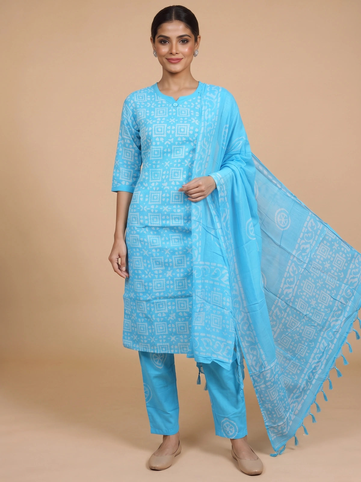 Sky blue and white batik print cotton kurti set with straight pants and tasseled dupatta