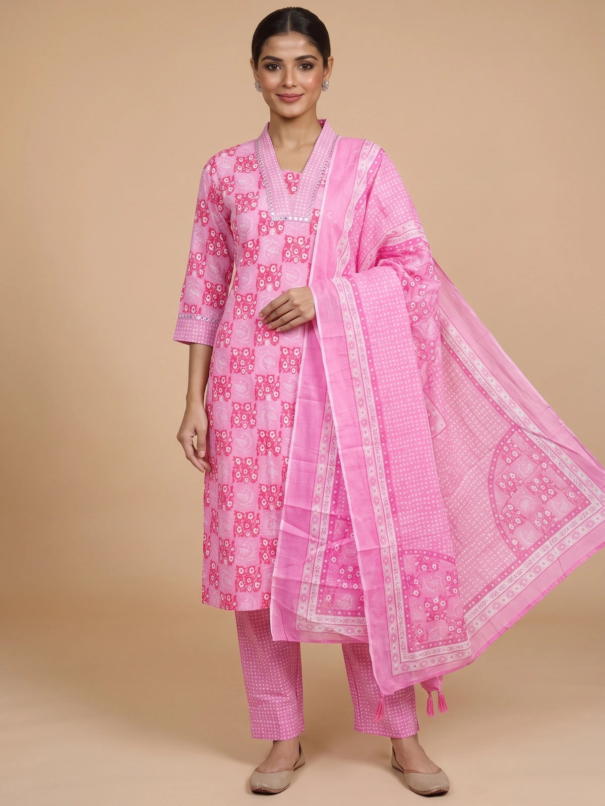 Pink floral print cotton kurti set with mirror-work neckline, straight pants, and matching printed dupatta