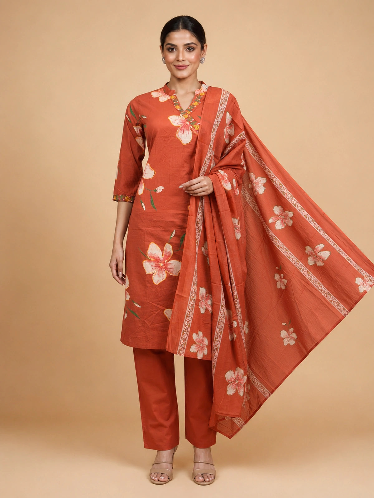 Rust floral cotton kurti set with embroidered neckline, straight pants and printed dupatta