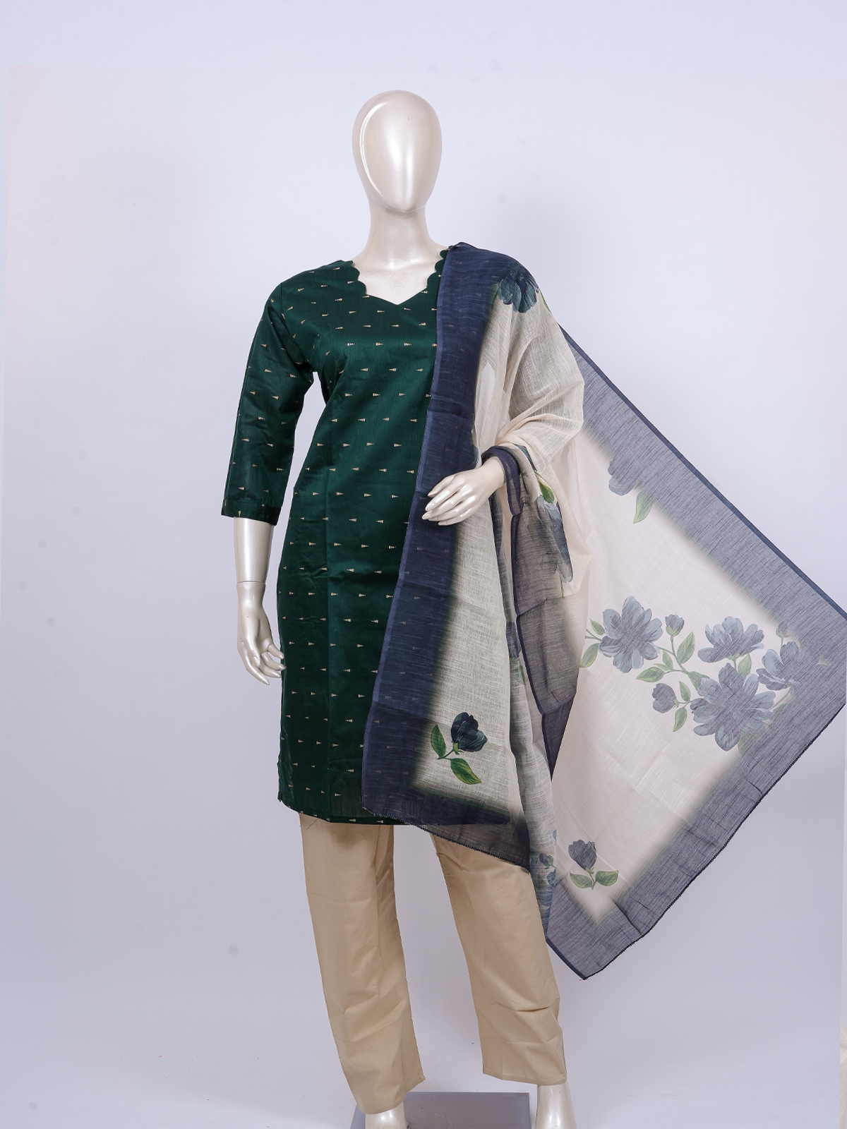 Bottle green zari butti kurti set with beige straight pants and cream floral printed dupatta