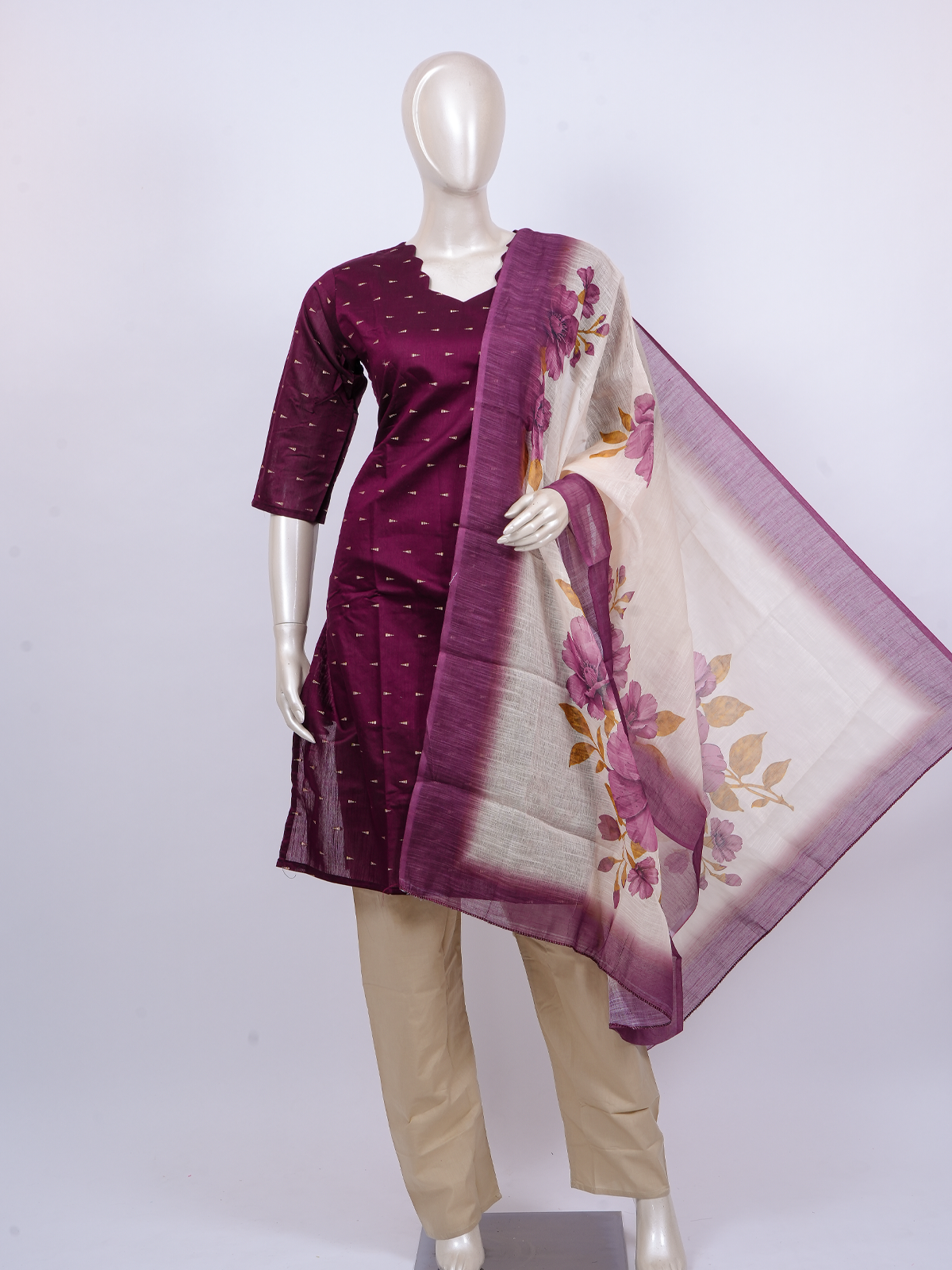 Purple zari butti kurti set with floral cream dupatta and beige straight pants
