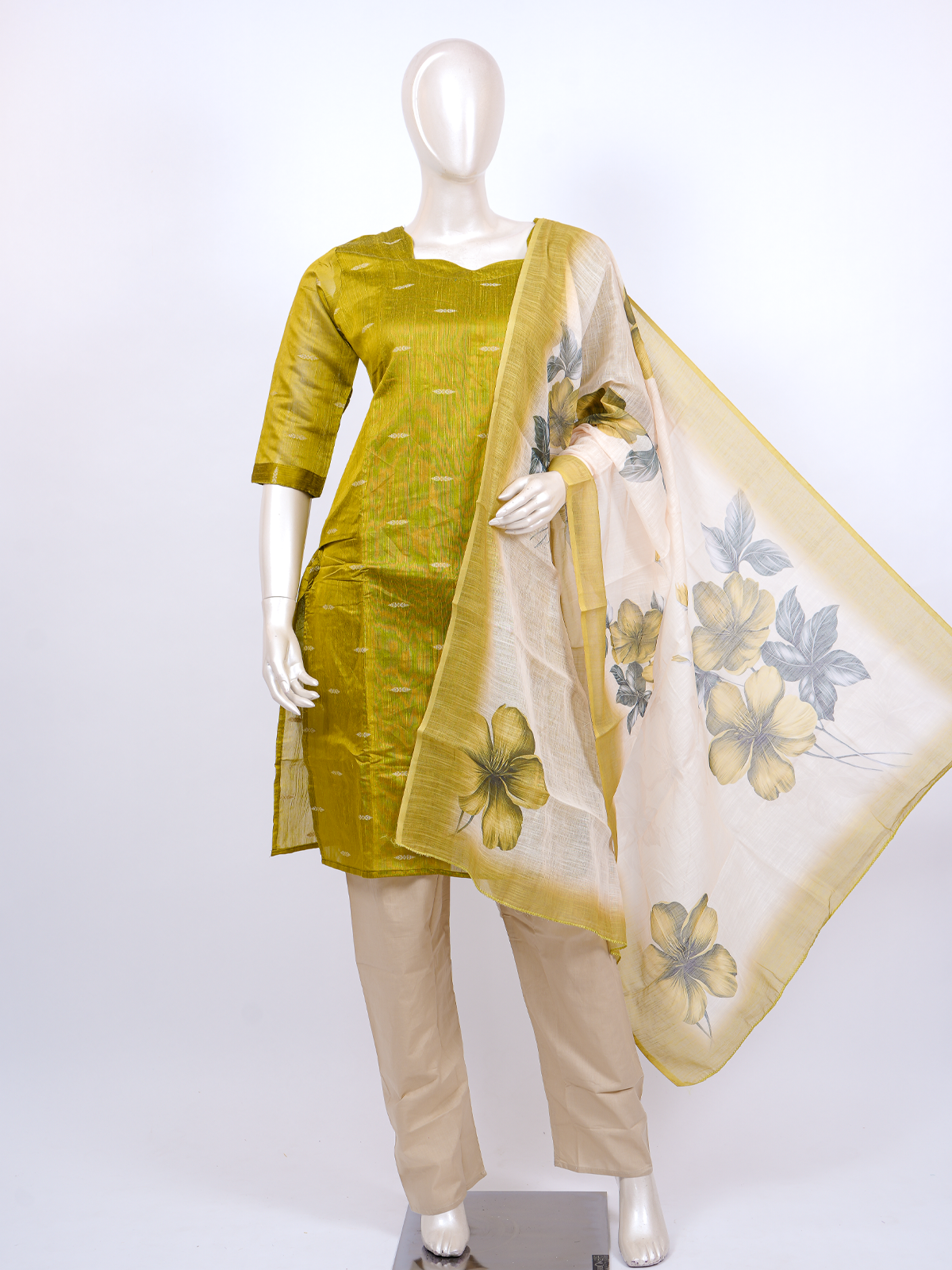 Mustard green textured silk kurti set with zari butis, beige straight pants and floral print cream dupatta