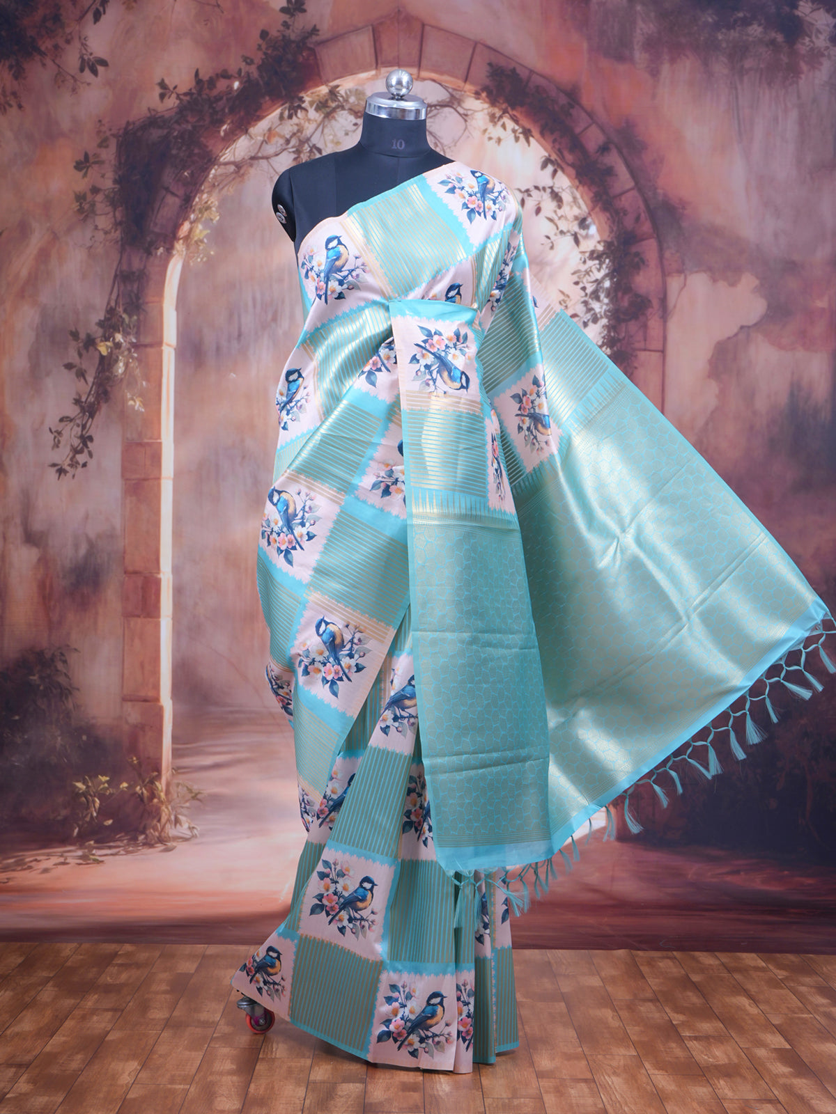The "Cyan Horizon  blue and pastel cream " Bird Motif Kanchipuram Silk Saree