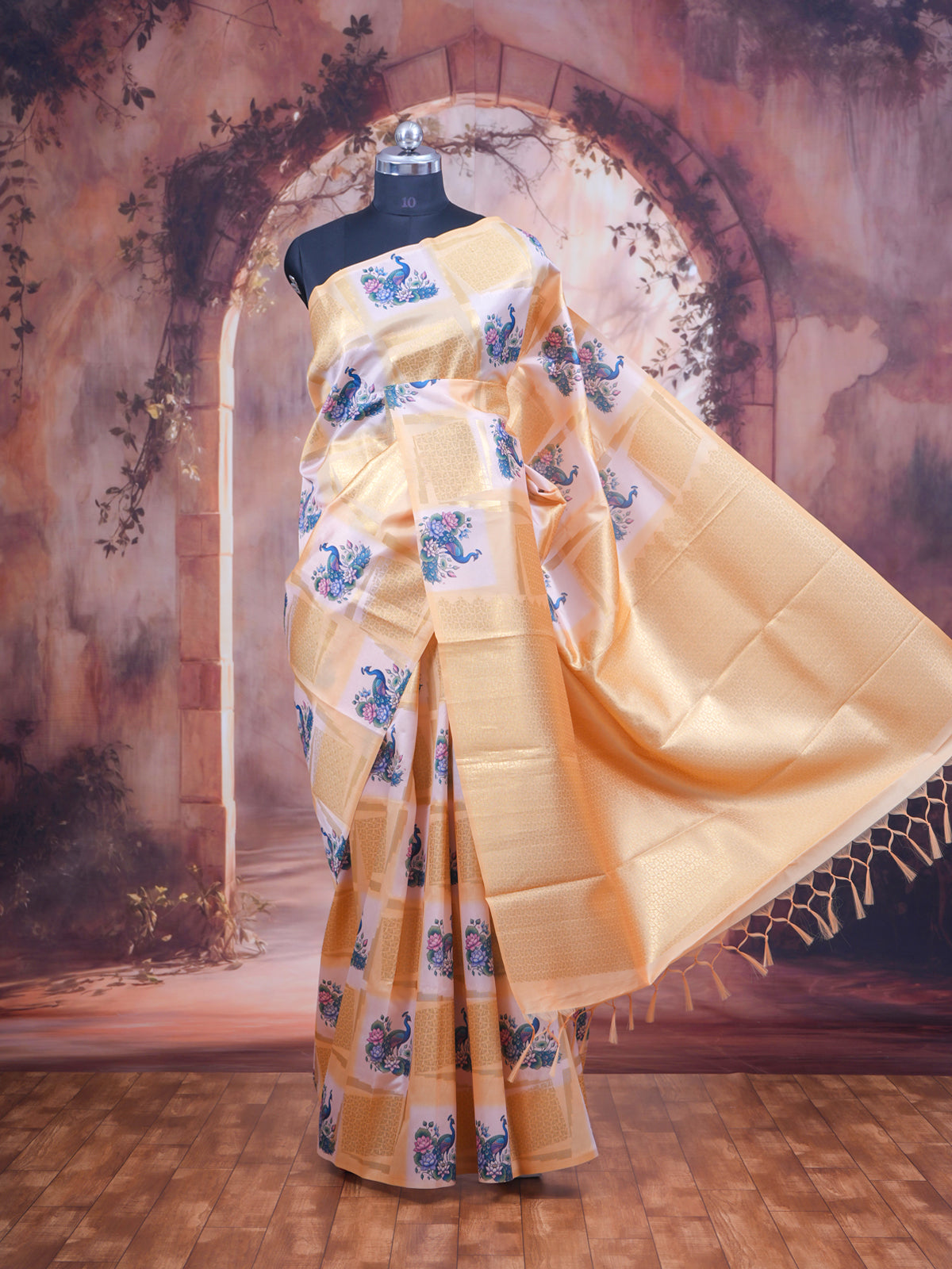 The Royal Peacock cream and pastel yellow Kanchipuram Silk Saree
