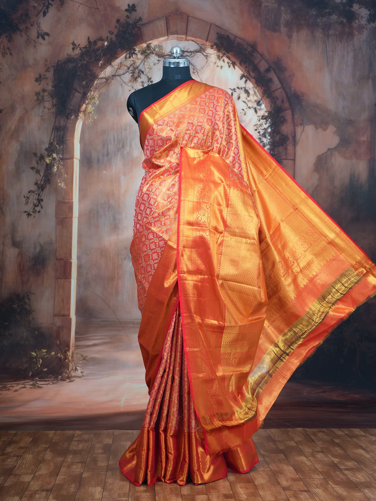 Vibrant Orange Kanchipuram Silk Saree with All-Over Brocade